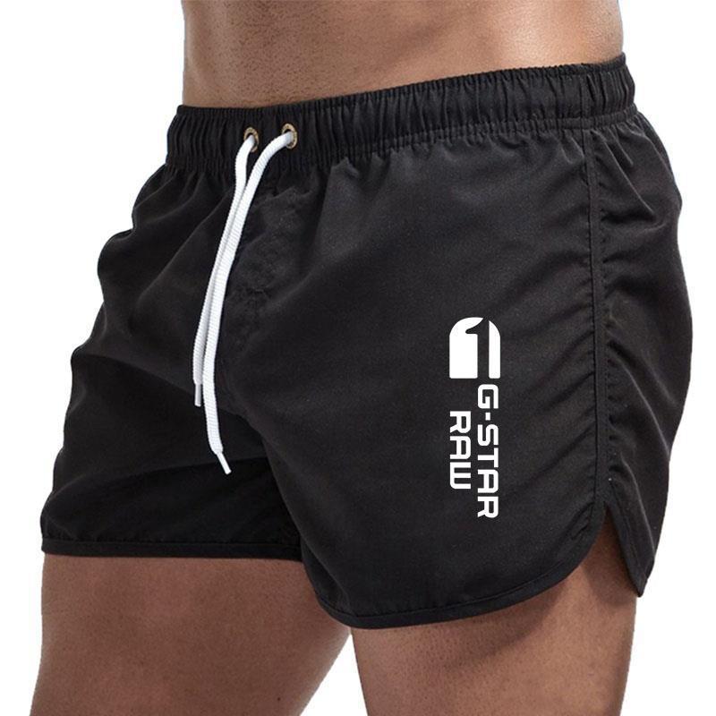 Men's fashionable beach shorts polyester multi - color sports men's three part shorts - FashionTech