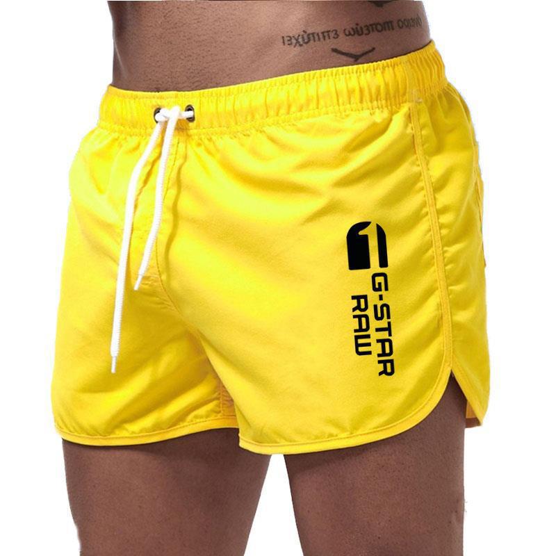 Men's fashionable beach shorts polyester multi - color sports men's three part shorts - FashionTech