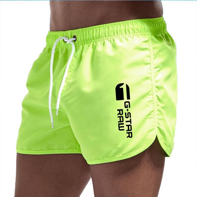 Men's fashionable beach shorts polyester multi - color sports men's three part shorts - FashionTech