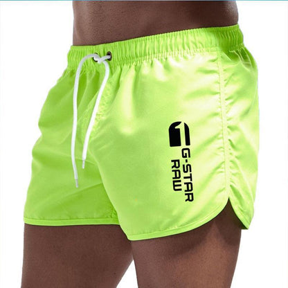 Men's fashionable beach shorts polyester multi - color sports men's three part shorts - FashionTech