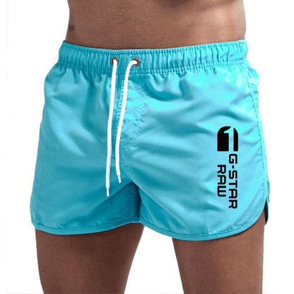 Men's fashionable beach shorts polyester multi - color sports men's three part shorts - FashionTech