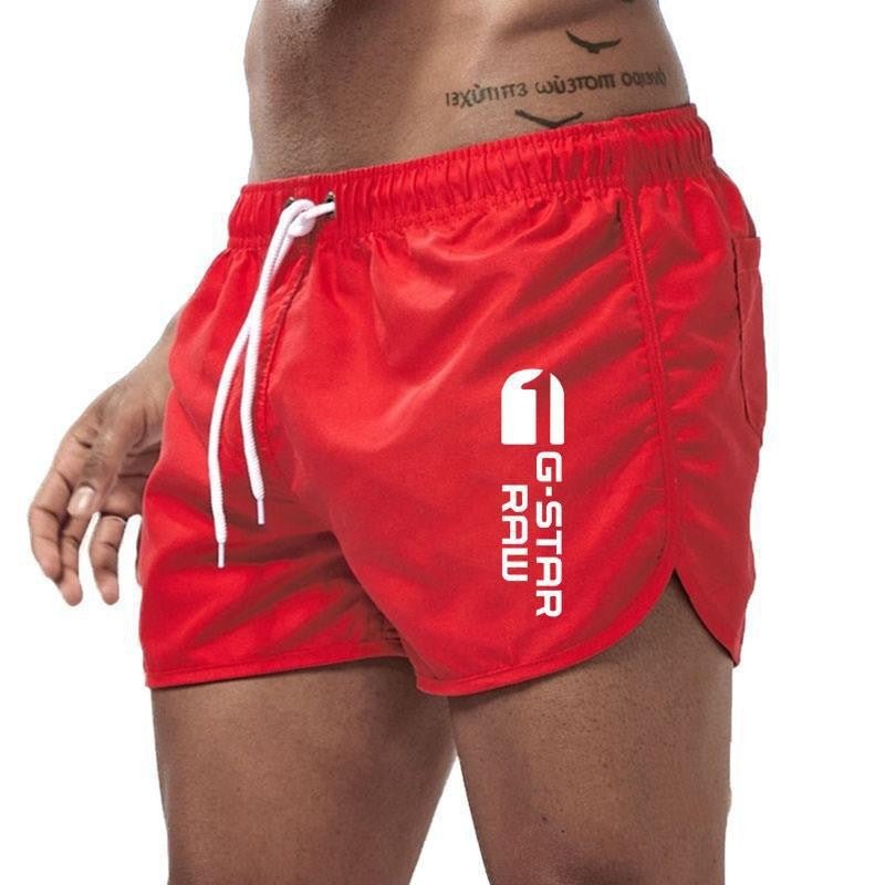 Men's fashionable beach shorts polyester multi - color sports men's three part shorts - FashionTech