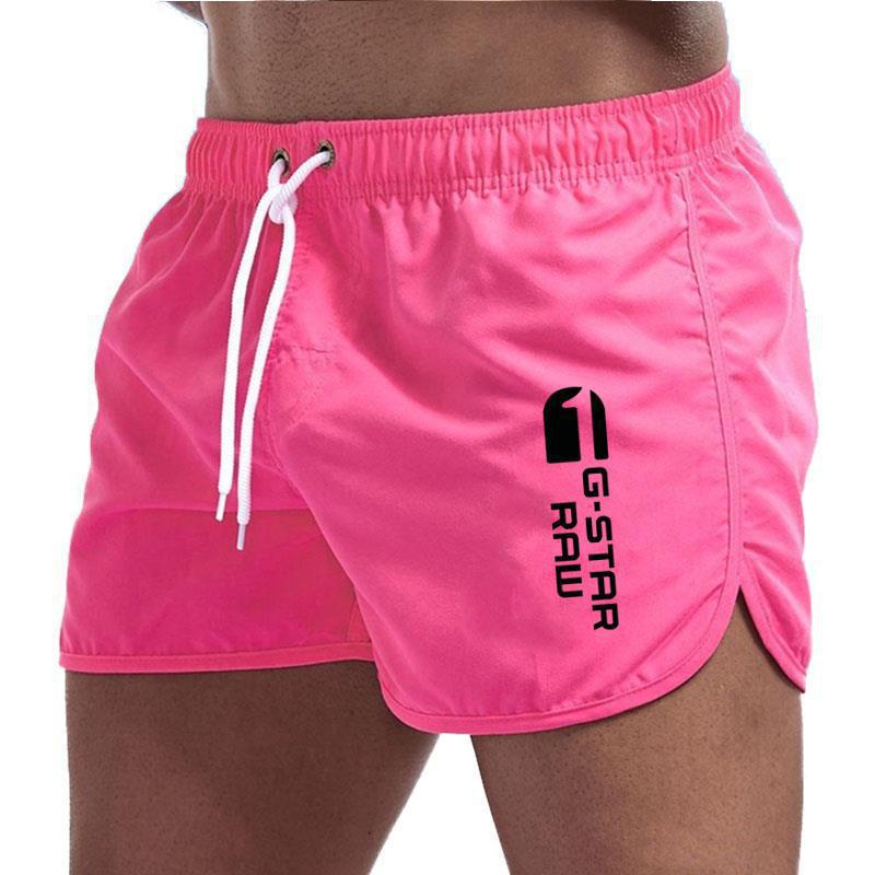 Men's fashionable beach shorts polyester multi - color sports men's three part shorts - FashionTech