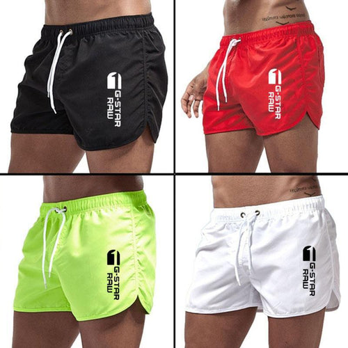 Men's fashionable beach shorts polyester multi - color sports men's three part shorts - FashionTech
