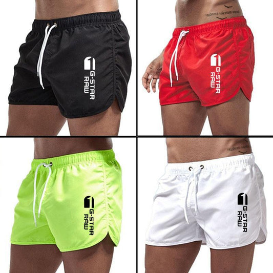 Men's fashionable beach shorts polyester multi - color sports men's three part shorts - FashionTech