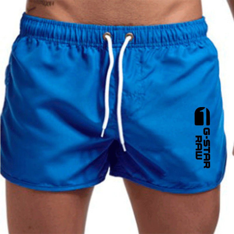 Men's fashionable beach shorts polyester multi - color sports men's three part shorts - FashionTech