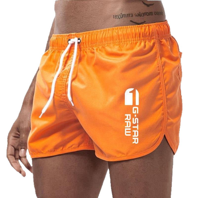 Men's fashionable beach shorts polyester multi - color sports men's three part shorts - FashionTech